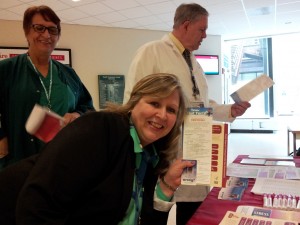 Hospital employees at Healthier U's table