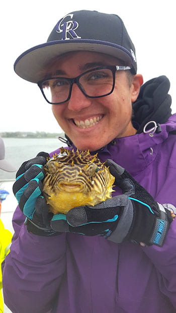 Lucy with a burrfish retrieved from Quantuck Bay