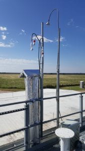 An aerosol sampling stack and inlet tubes at the DOE’s Atmospheric Radiation Measurement Program Site in Oklahoma for studying ice formation from aerosol particles.